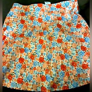 Many flowers on skirt good for spring